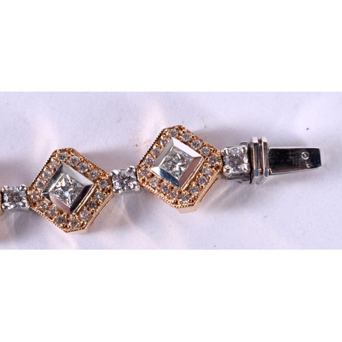 1193 - AN 18CT ROSE AND WHITE GOLD AND DIAMOND BRACELET.  Stamped 18K, length 14.7cm, weight 32g