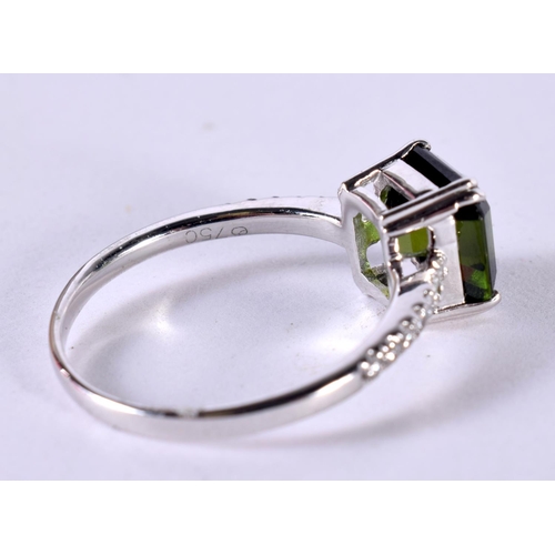 1199 - AN 18CT WHITE GOLD RING WITH DIAMOND ENCRUSTED SHOULDERS SET WITH A TOURMALINE.  Size Q, Stamped 750... 