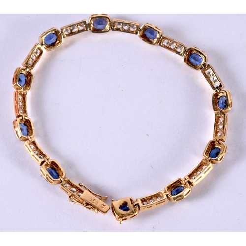 1201 - A SILVER GILT BRACELET SET WITH SAPPHIRES AND CZ.  Stamped 925, length 18.5cm, weight 11g