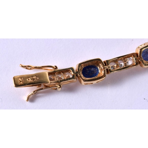 1201 - A SILVER GILT BRACELET SET WITH SAPPHIRES AND CZ.  Stamped 925, length 18.5cm, weight 11g