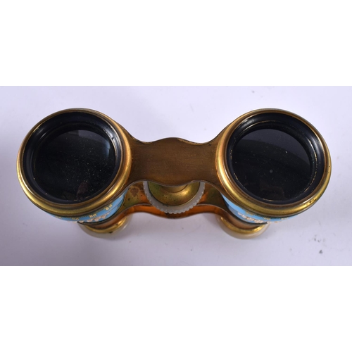 1202 - A CASED PAIR OF EDWARDIAN OPERA GLASSES WITH GILT AND ENAMEL DECORATION AND MOTHER OF PEARL EYE PADS... 