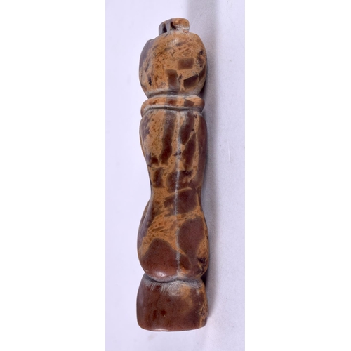 1217 - AFRICAN TRIBAL CARVED HARDSTONE PENDANT IN THE FORM OF A SEATED MALE.  5cm x 1.1cm x 1.2 cm, weight ... 