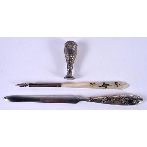 1230 - AN ART NOUVEAU CASED DESK STATIONERY SET COMPRISING LETTER OPENER, SEAL AND DIP PEN WITH A MOTHER OF... 