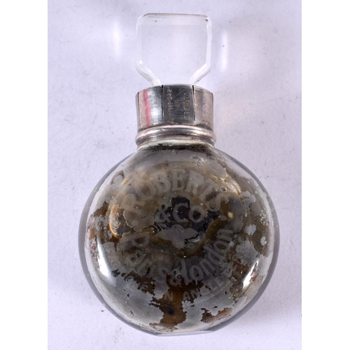 1233 - A SCENT BOTTLE WITH A SILVER COLLAR IN A FITTED LEATHER CASE.  Hallmarked Birmingham 1913, 6.7cm x 4... 