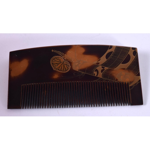 1237 - A JAPANESE DESIGN FAUX TORTOISESHELL COMB.  6.1cm x 12.4cm x 1.1cm, weight 35g