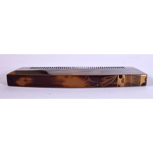 1237 - A JAPANESE DESIGN FAUX TORTOISESHELL COMB.  6.1cm x 12.4cm x 1.1cm, weight 35g