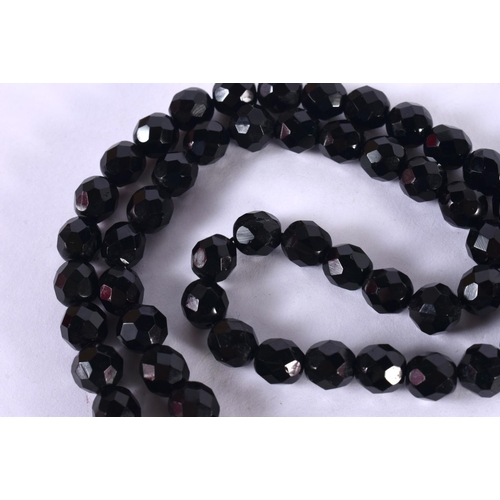 1241 - A BEAD NECKLACE.  104cm long, weight 72g