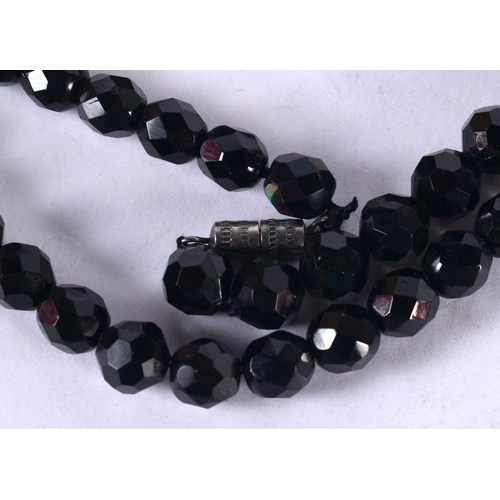 1241 - A BEAD NECKLACE.  104cm long, weight 72g