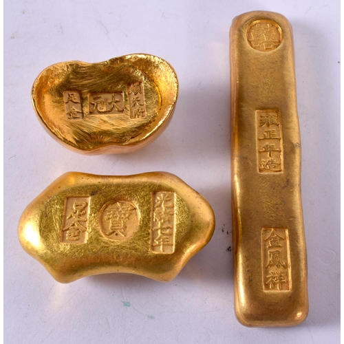 1250 - THREE YELLOW METAL WEIGHTS WITH CHINESE DECORATION (3)