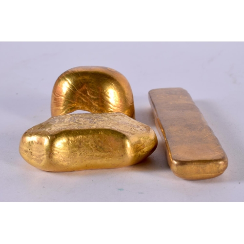 1250 - THREE YELLOW METAL WEIGHTS WITH CHINESE DECORATION (3)