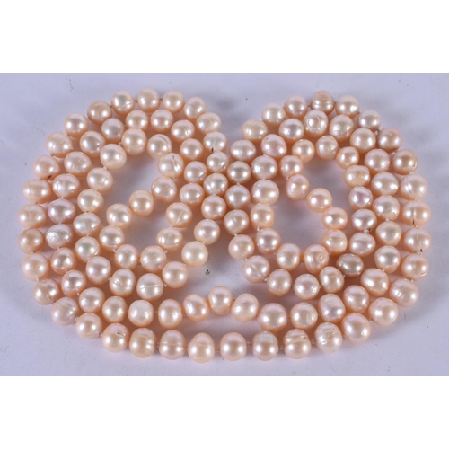 1260 - A PEARL NECKLACE.  Length 124cm, Bead size 8.1mm, weight 136g