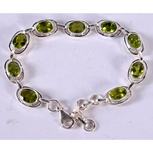 1264 - A SILVER BRACELET WITH SILVER MOUNTED GEMS.  Stamped 925, Length 20cm, weight 13.8g