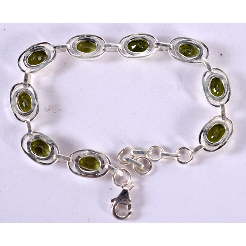 1264 - A SILVER BRACELET WITH SILVER MOUNTED GEMS.  Stamped 925, Length 20cm, weight 13.8g