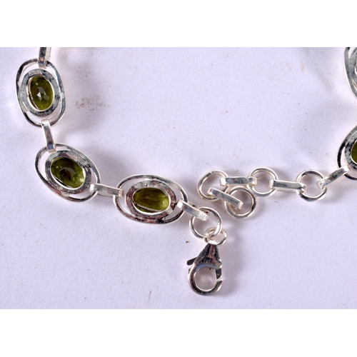 1264 - A SILVER BRACELET WITH SILVER MOUNTED GEMS.  Stamped 925, Length 20cm, weight 13.8g