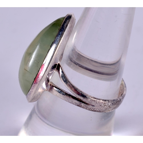 1266 - A SILVER RING SET WITH A TEARDROP JADE STONE.  Size O, Stamped 925, weight 7.3g