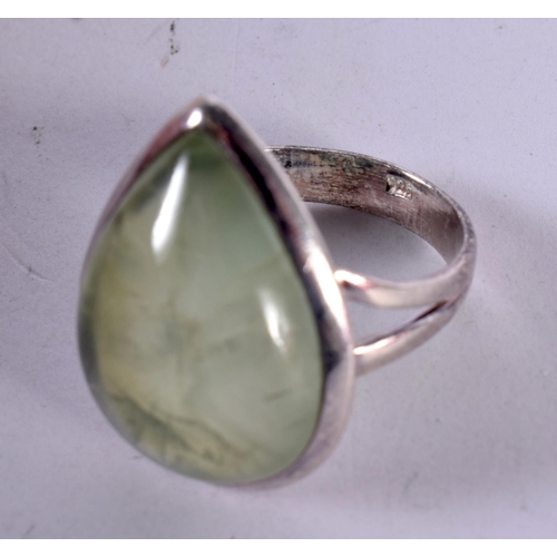 1266 - A SILVER RING SET WITH A TEARDROP JADE STONE.  Size O, Stamped 925, weight 7.3g