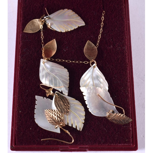 1278 - A MOTHER OF PEARL LEAF NECKLACE WITH 2 PAIRS OF MATCHING EARRINGS.  Pendant 2.3cm, Chain 39cm, total... 