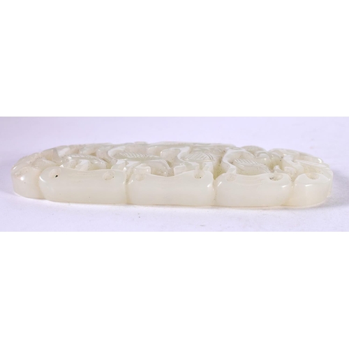 1282 - A PIERCED JADE CARVING.  9cm x 4cm x 0.9cm, weight 52.6g