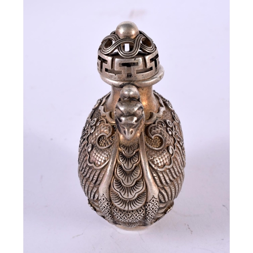 1286 - A CHINESE WHITE METAL SNUFF BOTTLE.  8.2 cm x 6.4cm x 4cm, weight 174.3g