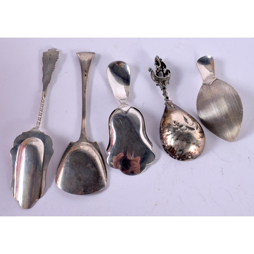 1288 - FIVE CONTINENTAL SILVER CADDY SPOONS.  Largest 11.4cm x 3.3cm, total weight 54g (5)