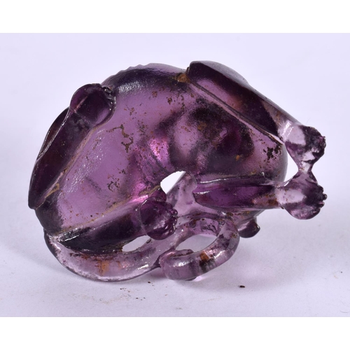 1289 - CHINESE CARVED AMETHYST FOO DOG.  5cm x 3.7cm x 2.4cm, weight 45.1g