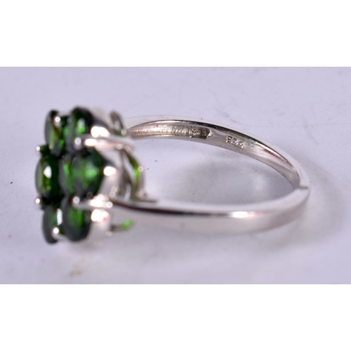 1293 - A SILVER GEM SET CLUSTER RING.  Size R, Stamped 925, weight 3.8g