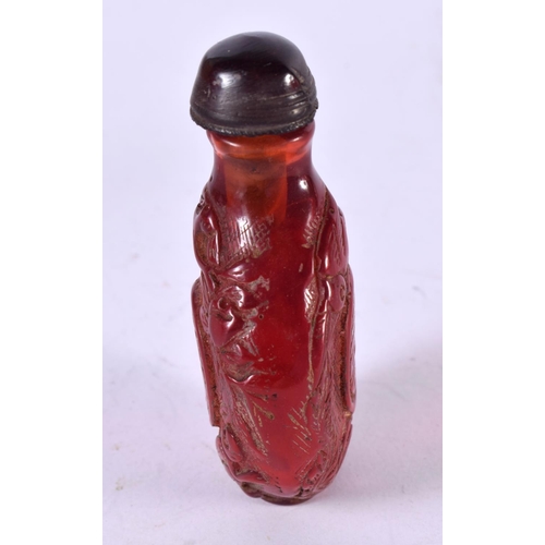 1295 - AN AMBER COLOURED SNUFF BOTTLE.  7.1cm x 4cm x 2.3cm, weight 36.9g