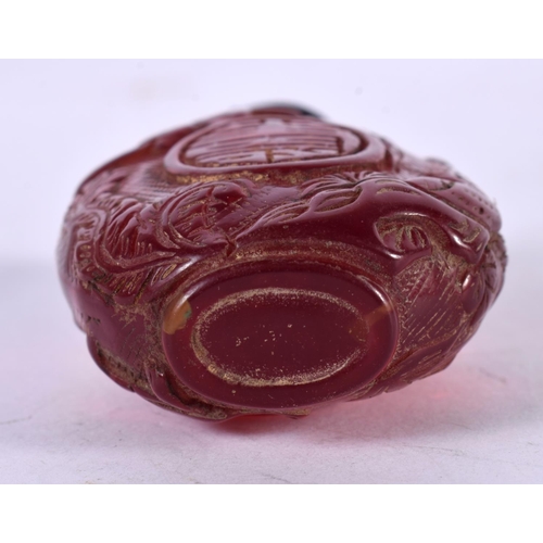 1295 - AN AMBER COLOURED SNUFF BOTTLE.  7.1cm x 4cm x 2.3cm, weight 36.9g