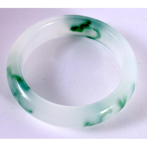 1298 - A TWO TONE JADE BANGLE.  Internal 6 cm, weight 64.5g