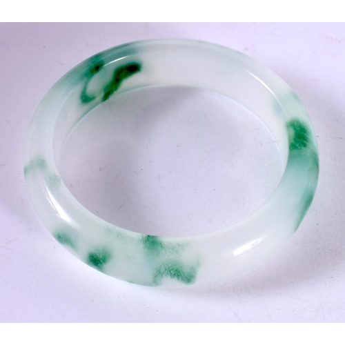 1298 - A TWO TONE JADE BANGLE.  Internal 6 cm, weight 64.5g