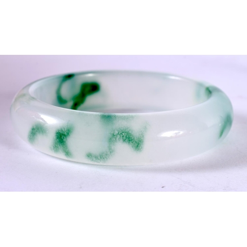 1298 - A TWO TONE JADE BANGLE.  Internal 6 cm, weight 64.5g