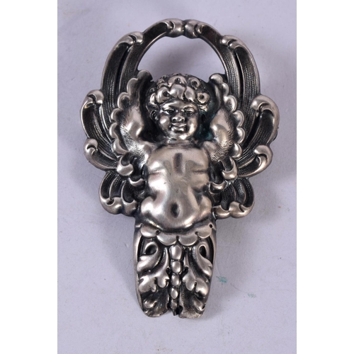 1301 - A CONTINENTAL SILVER CHERUB BROOCH. 19.9 grams. 7.5 cm x 4.75 cm.