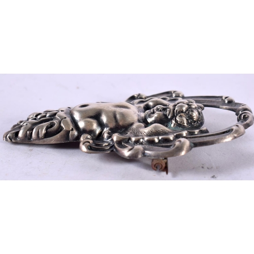 1301 - A CONTINENTAL SILVER CHERUB BROOCH. 19.9 grams. 7.5 cm x 4.75 cm.