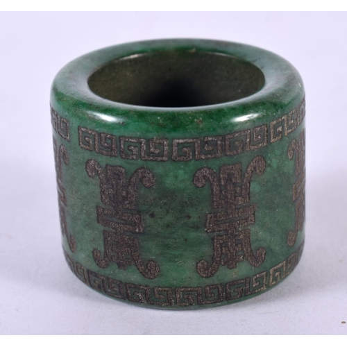 1304 - A CHINESE CARVED JADE ARCHER'S RING. Z. 37 grams.