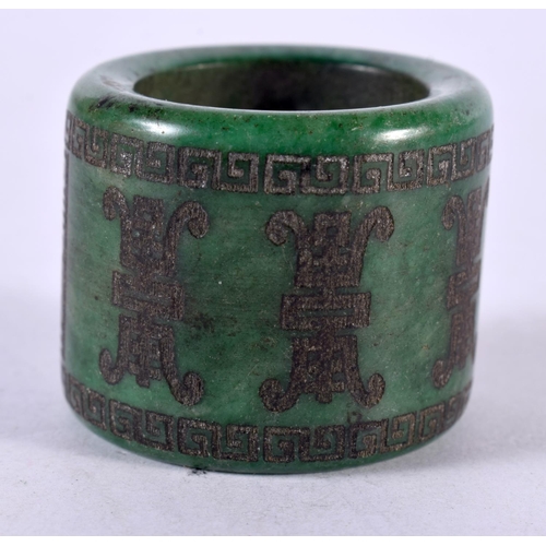 1304 - A CHINESE CARVED JADE ARCHER'S RING. Z. 37 grams.