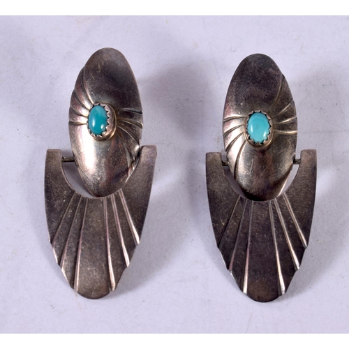 1305 - A PAIR OF SILVER AND TURQUOISE EARRINGS. 7.3 grams. 4.5 cm x 2 cm.