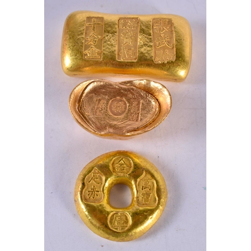 1307 - THREE CHINESE YELLOW METAL INGOTS. 336 grams. Largest 6 cm x 3.25 cm. (3)