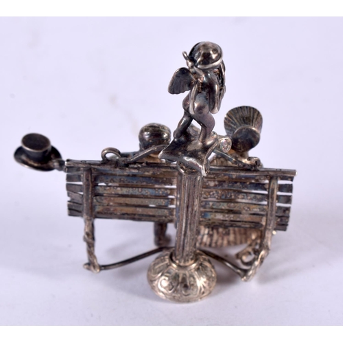 1309 - A CONTINENTAL SILVER FIGURE. 38 grams. 6 cm x 5 cm.