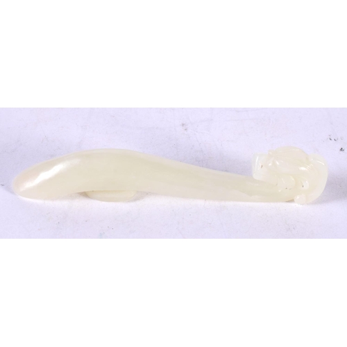 1313 - A CHINESE CARVED WHITE JADE BELT HOOK. 28 grams. 10 cm x 2 cm.