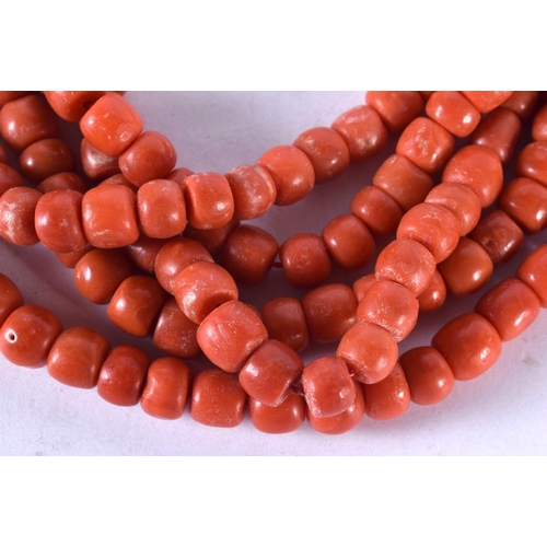 1330 - AN 18CT GOLD AND CORAL NECKLACE. 241 grams. 36 cm long.