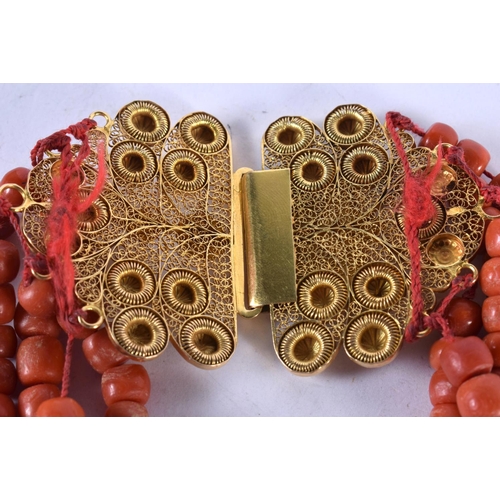 1330 - AN 18CT GOLD AND CORAL NECKLACE. 241 grams. 36 cm long.