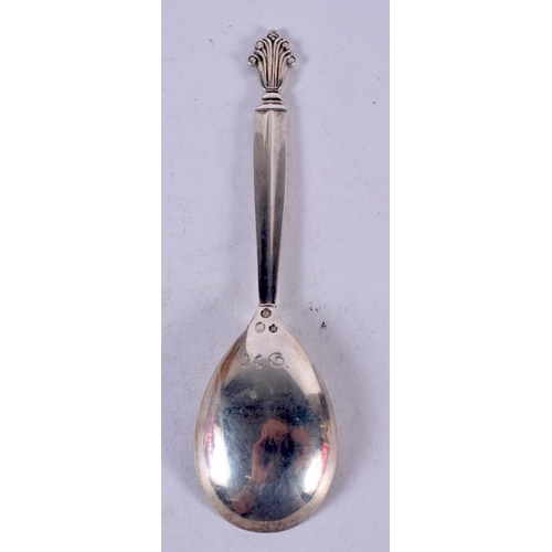 1333 - A GEORG JENSEN SILVER SPOON. 34 grams. 15cm x 4 cm.