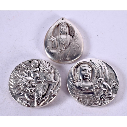 1335 - THREE CHINESE WHITE METAL PENDANTS. 193 grams. 4.5 cm wide. (3)