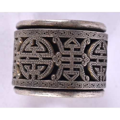 1343 - A CHINESE WHITE METAL ARCHER'S RING. Y. 38.5 grams.