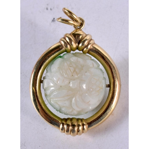 1347 - AN ANTIQUE CHINESE 14CT GOLD AND JADEITE REVOLVING PENDANT. 20 grams. 4.25 cm x 3 cm.