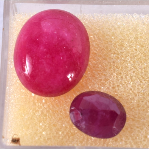 1348 - FOUR LOOSE GEMSTONES Ruby and Smoky Quartz. 5.6 grams. Largest 4.25 cm x 3 cm. (4)