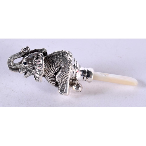 1349 - A SILVER ELEPHANT BABIES RATTLE. 18 grams. 9.5 cm x 3 cm.