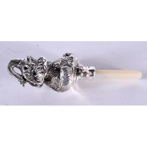 1349 - A SILVER ELEPHANT BABIES RATTLE. 18 grams. 9.5 cm x 3 cm.