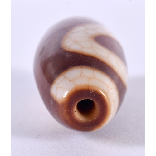 1353 - A CHINESE TIBETAN AGATE ZHU BEAD. 26.9 grams. 5 cm x 2 cm.