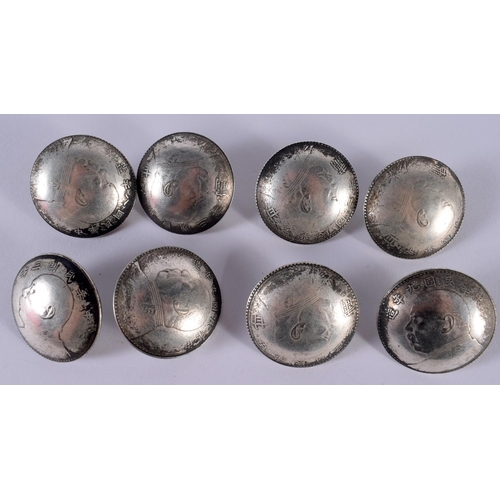 1359 - EIGHT CHINESE WHITE METAL BUTTONS. 209 grams. 3.75 cm x 1.75 cm. (8)